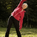 Healthy senior stretching