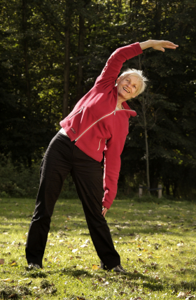 Healthy senior stretching