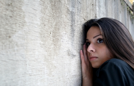 anxious hispanic woman