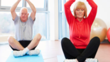 Seniors doing yoga